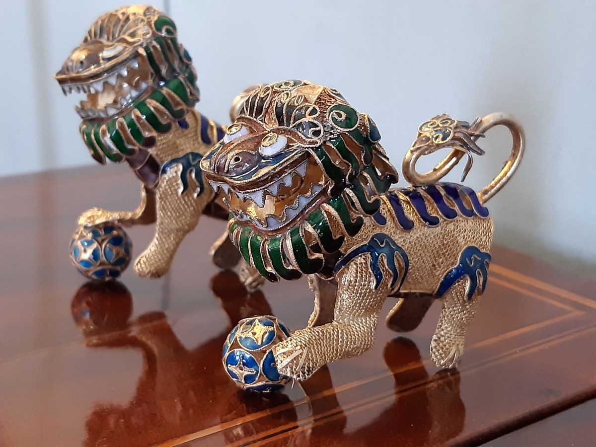 Pair of Chinese silver gilt & enamel dogs of foo